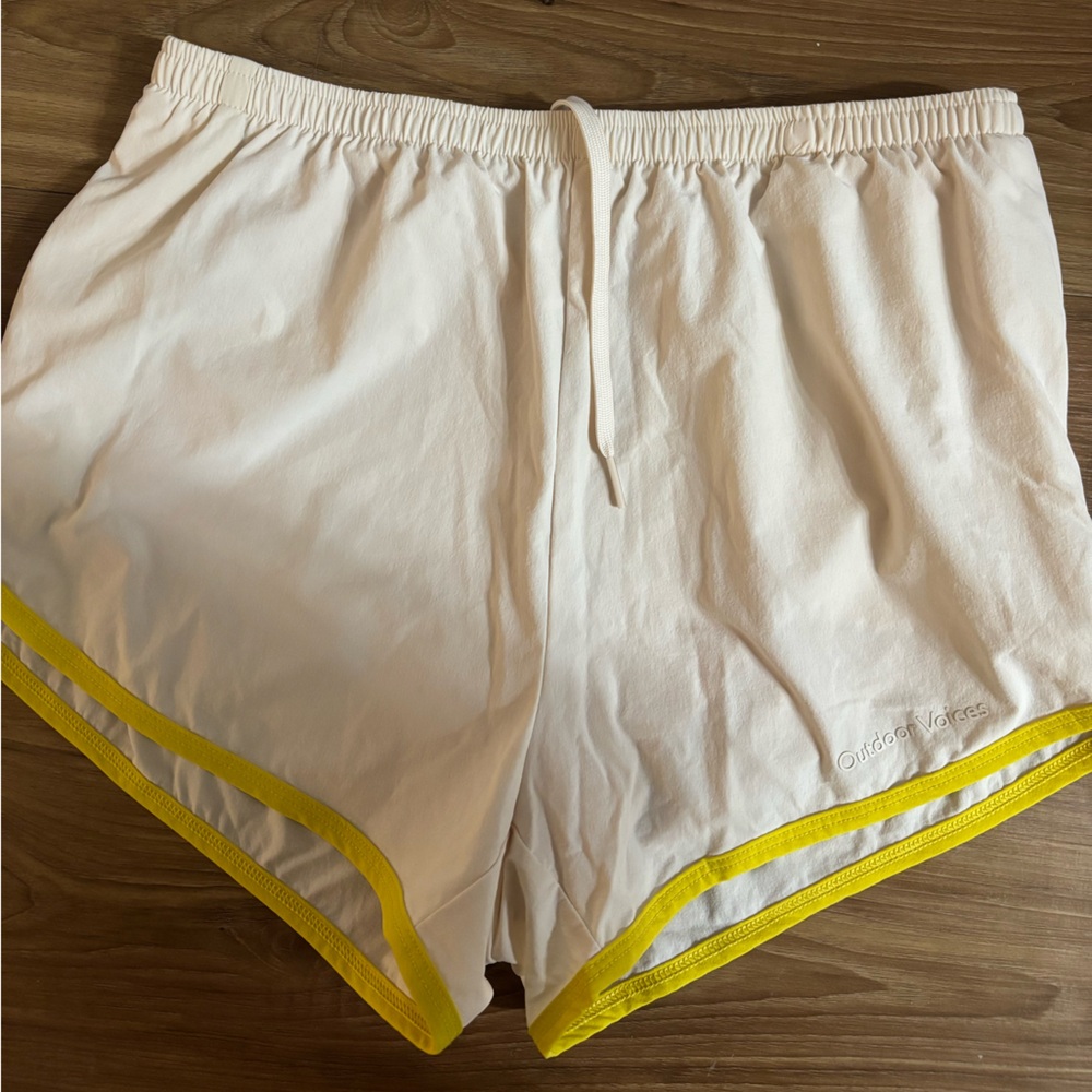 Too small for me but so cute outdoor voices shorts light pink with yellow lining